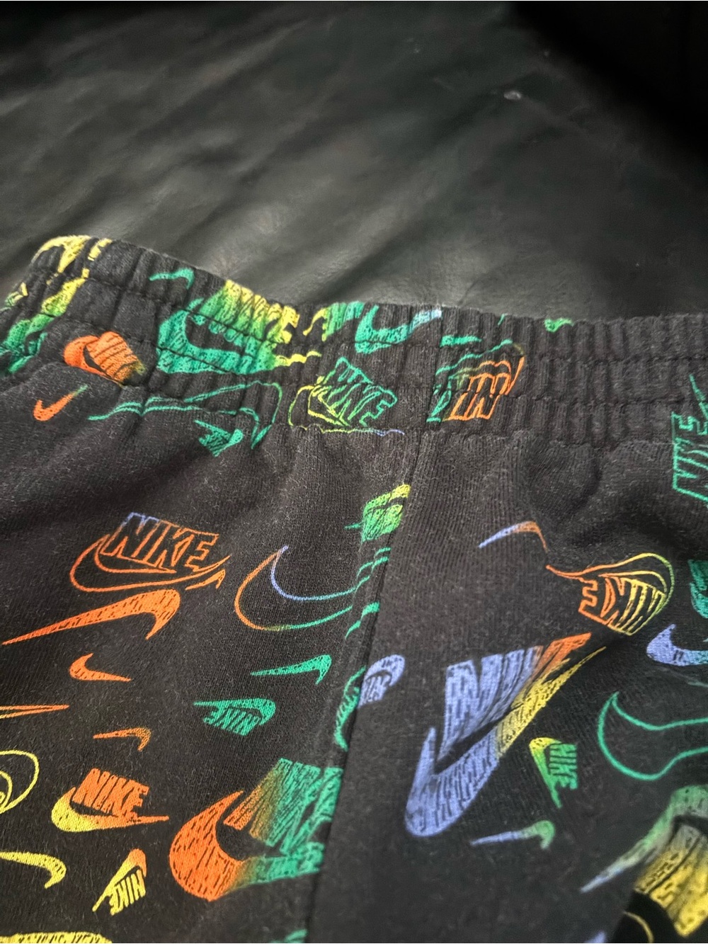 Nike Kids Black Sweatpants with Multicolor Logo Print